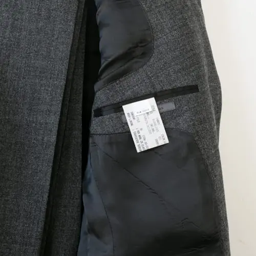 Tag inside suit jacket