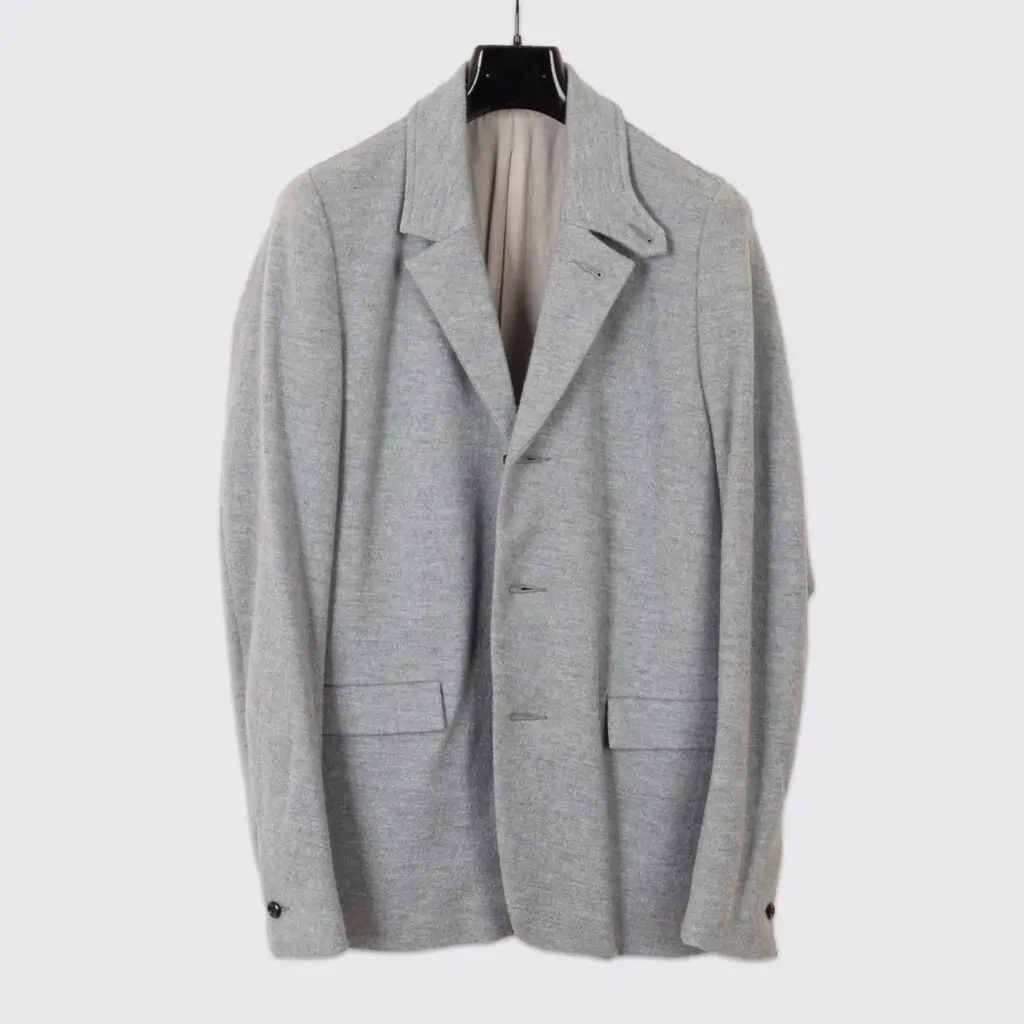 Light gray unstructured sport coat, made in Japan, on hanger