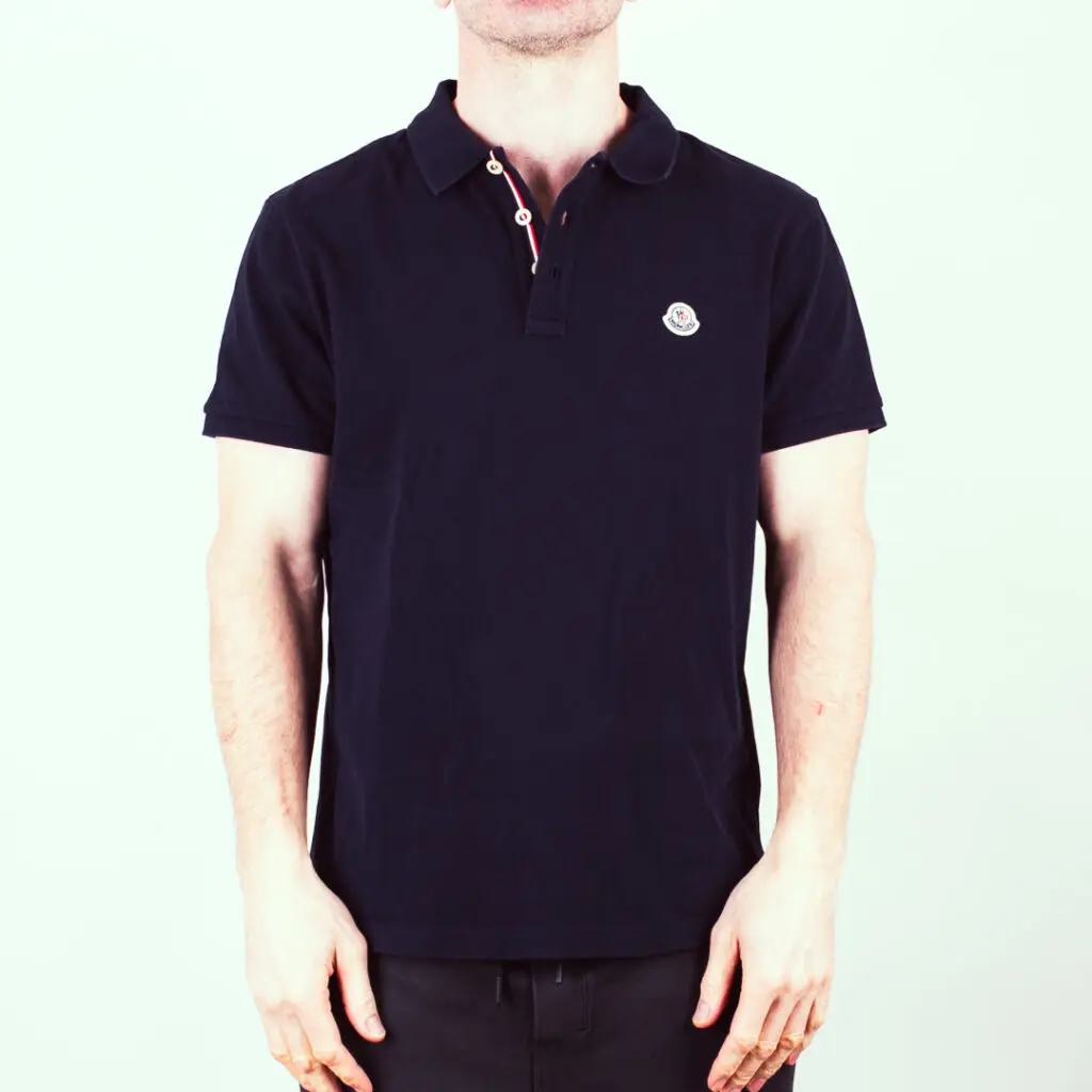 Moncler mesh polo with small patch logo and striped placket