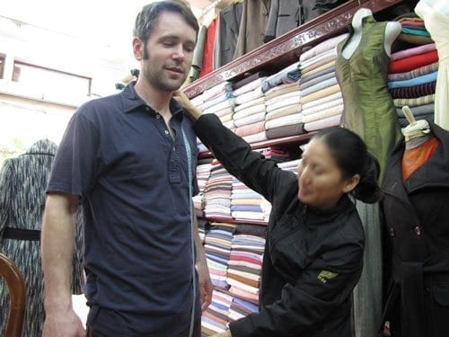custom tailoring experience in hoi an. Being measured