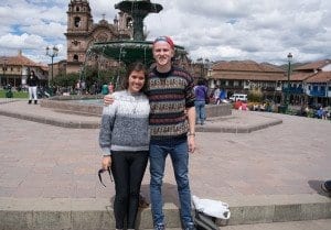 tourists wearing colorful sweaters in Cusco, Peru