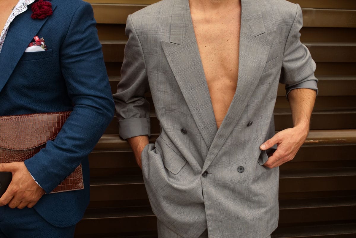 double breasted suit without shirt at pitti uomo